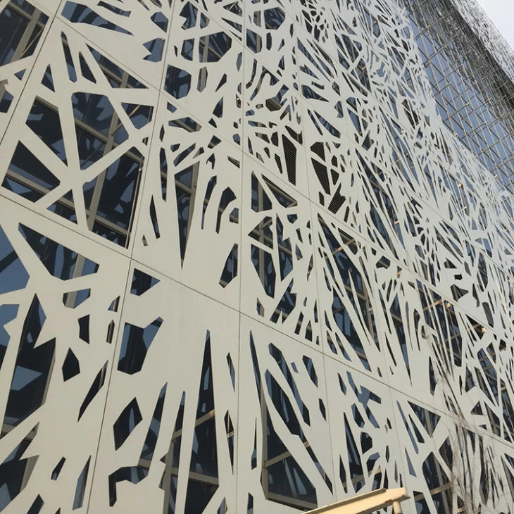 Perforated curtain wall panels