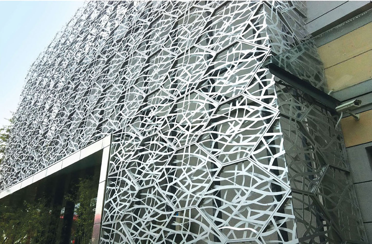 Perforated curtain wall panels